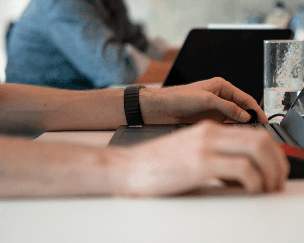 a man working on a computer designing a product